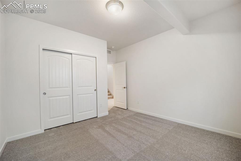 Image 23 of 30: Bedroom