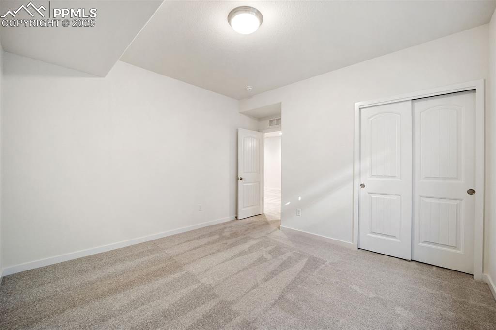 Image 24 of 30: Bedroom