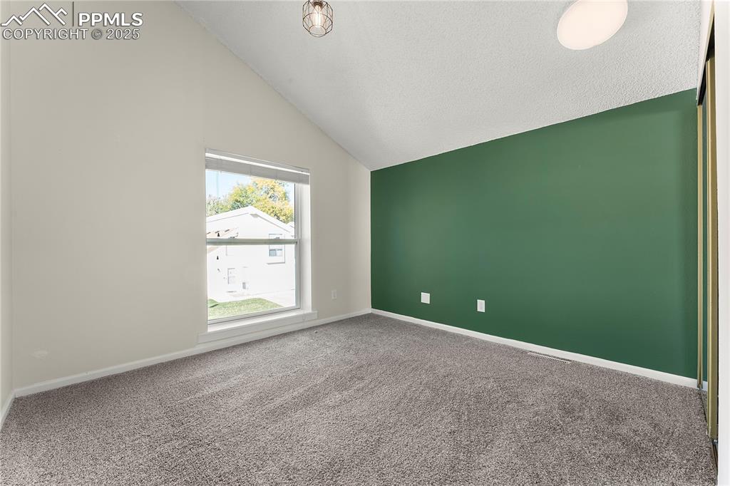 Image 21 of 33: Carpeted bedroom on 2nd floor