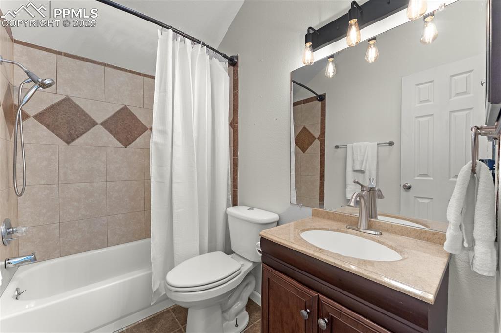 Image 23 of 33: Full bathroom featuring shower / tub combo and vanity on 2nd floor