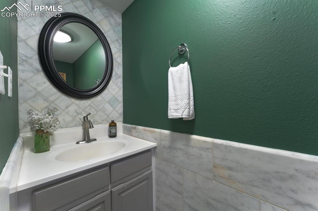 Image 6 of 33: Powder room on main floor