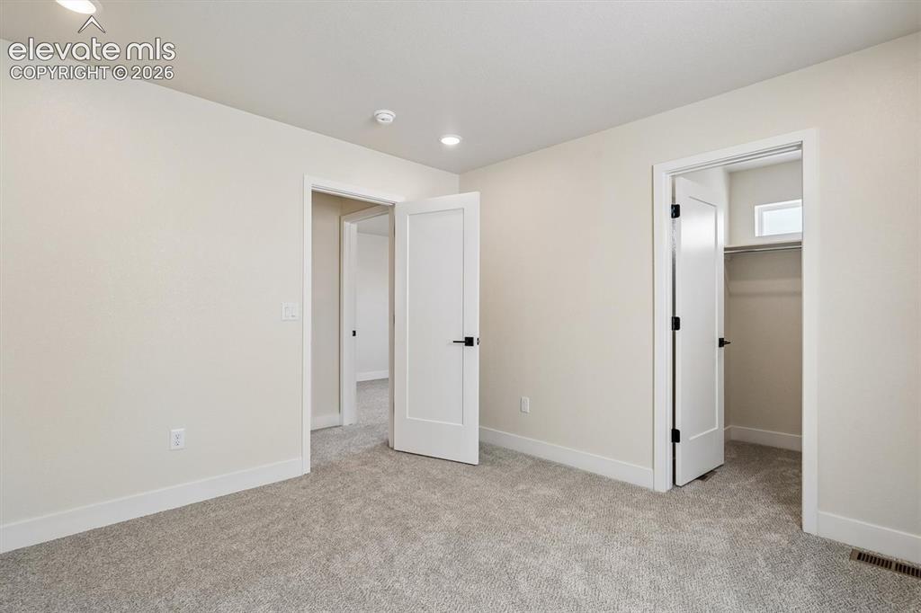 Image 14 of 28: Bedroom