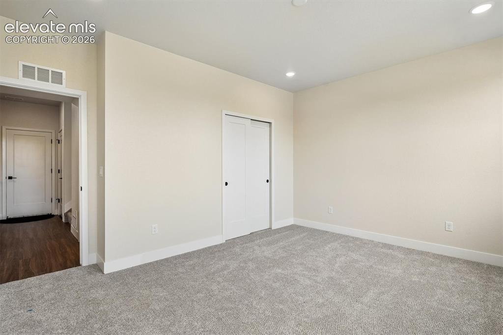 Image 21 of 28: Bedroom