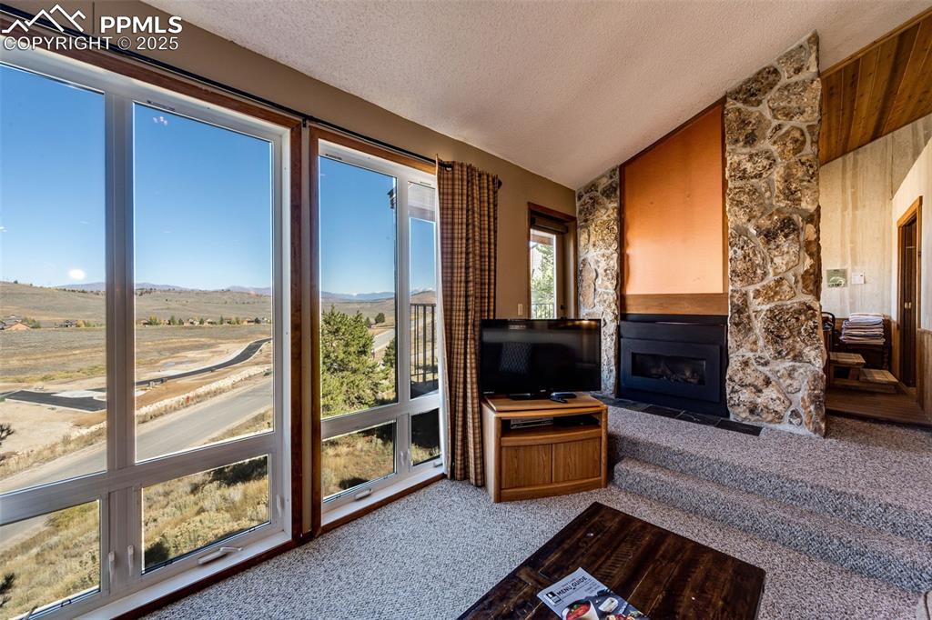 Image 15 of 42: Sunroom / solarium featuring vaulted ceiling