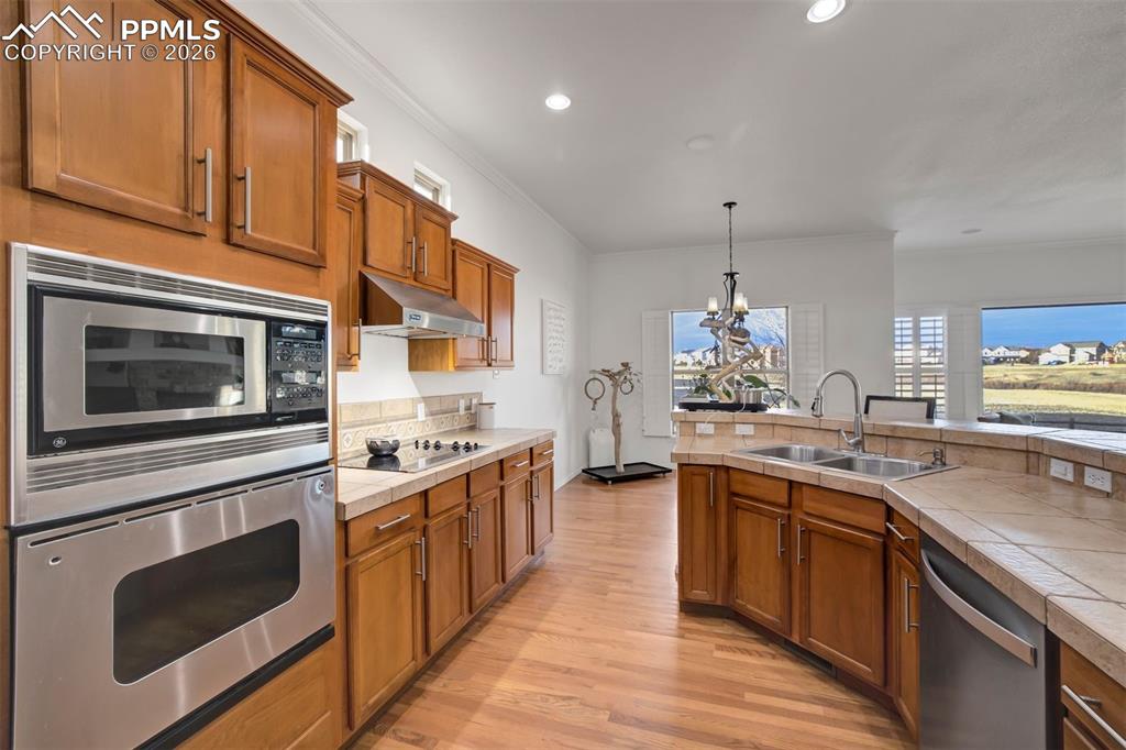 Image 14 of 50: **New microwave and stove are being installed on March 9th