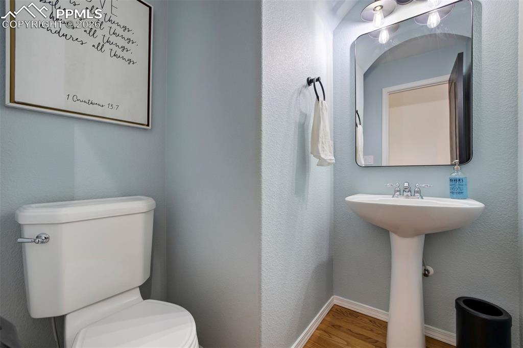 Image 30 of 50: Half bath on the main level