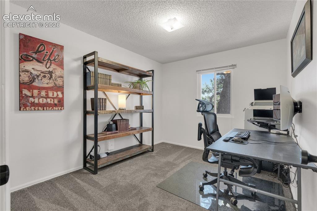 Image 18 of 30: Bedroom #3- great natural lighting and Mountain views