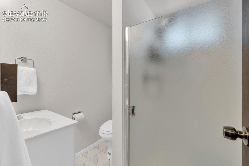 Image 25 of 30: Bathroom with Shower- lower level