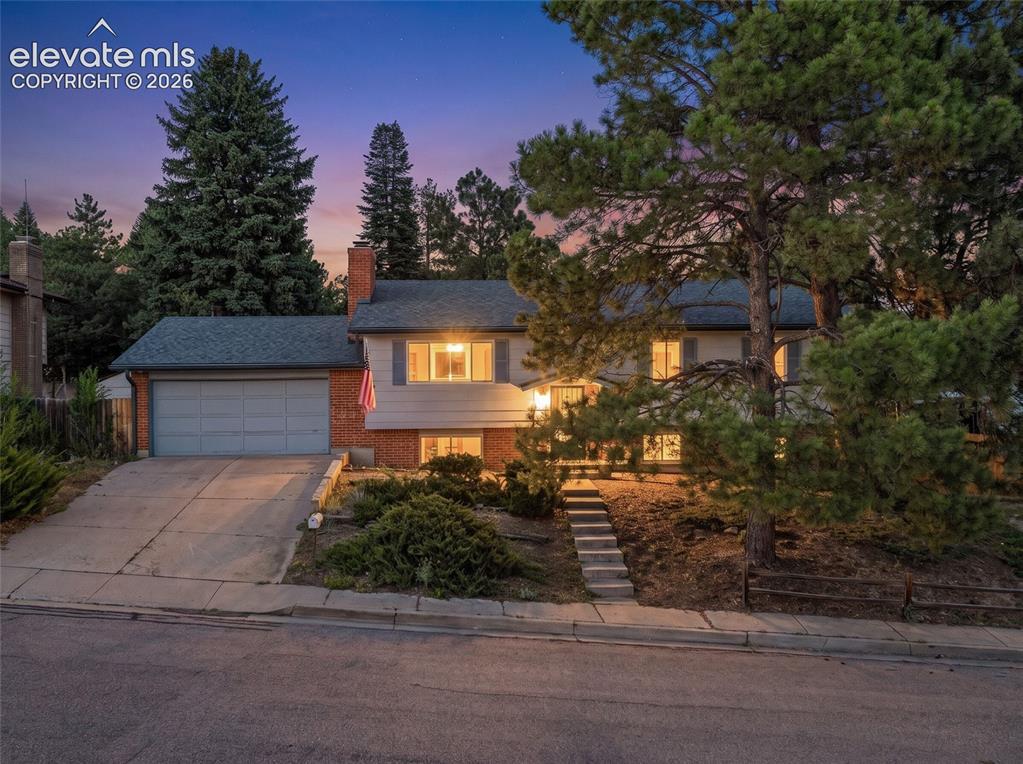 Image 4 of 30: Front of Home- twilight