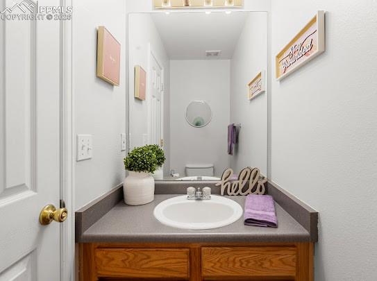 Image 12 of 27: Powder room on Main