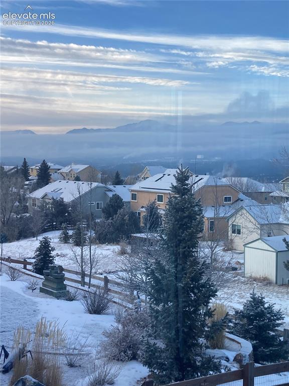 Image 44 of 49: Elevated mountain and distant urban landscape scenery