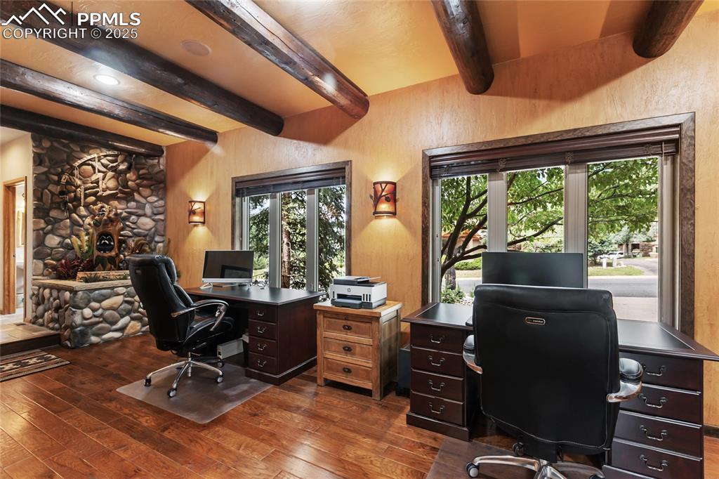 Image 22 of 46: The Primary wing office space with treed views