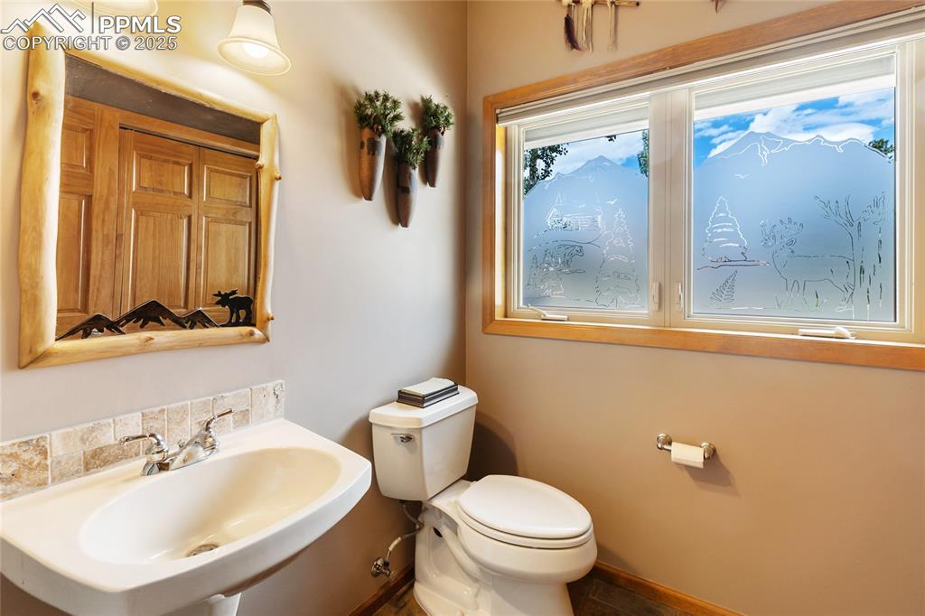 Image 31 of 46: 1/2 bath on the main