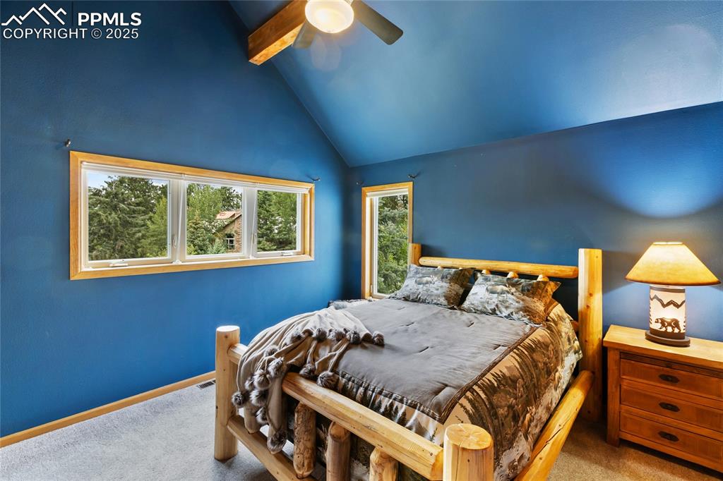 Image 32 of 46: One of two upper level bedrooms