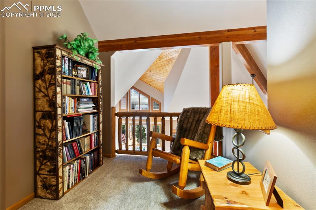 Image 35 of 46: Upper level loft perfect for reading, home office or play area