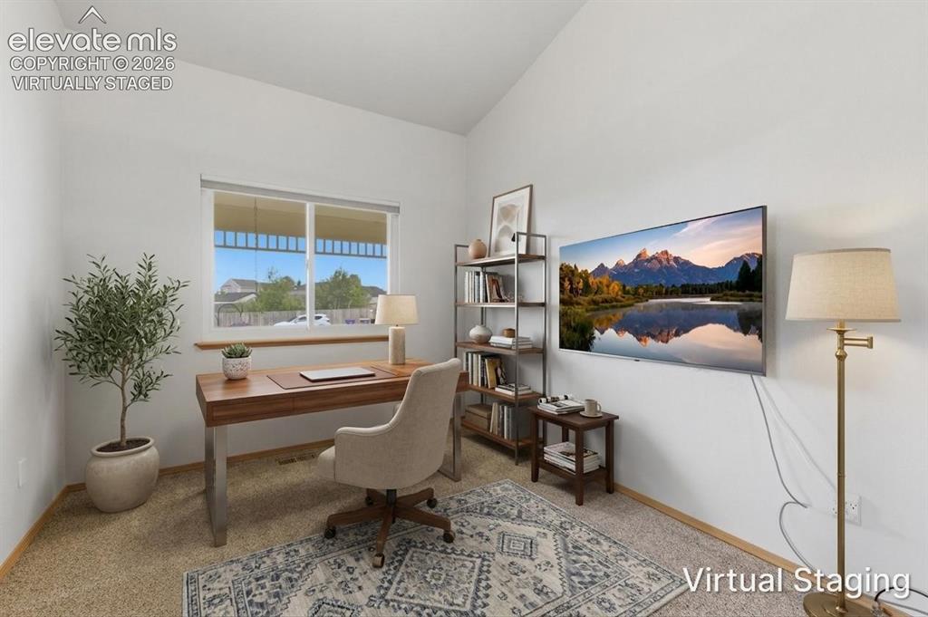 Image 24 of 50: Primary attached sitting room, office or nursery virtually staged