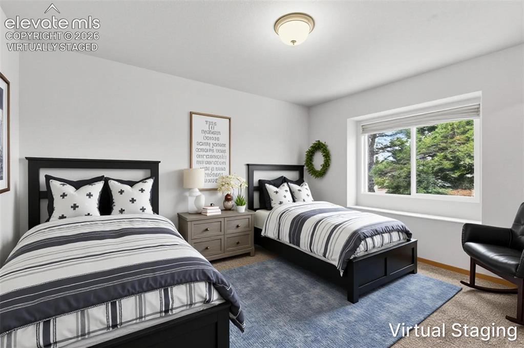 Image 32 of 50: 3rd main bedroom virtually staged