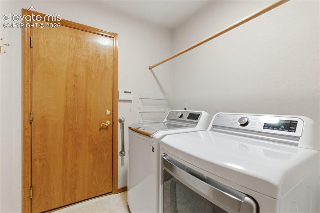 Image 35 of 50: Main laundry off garage