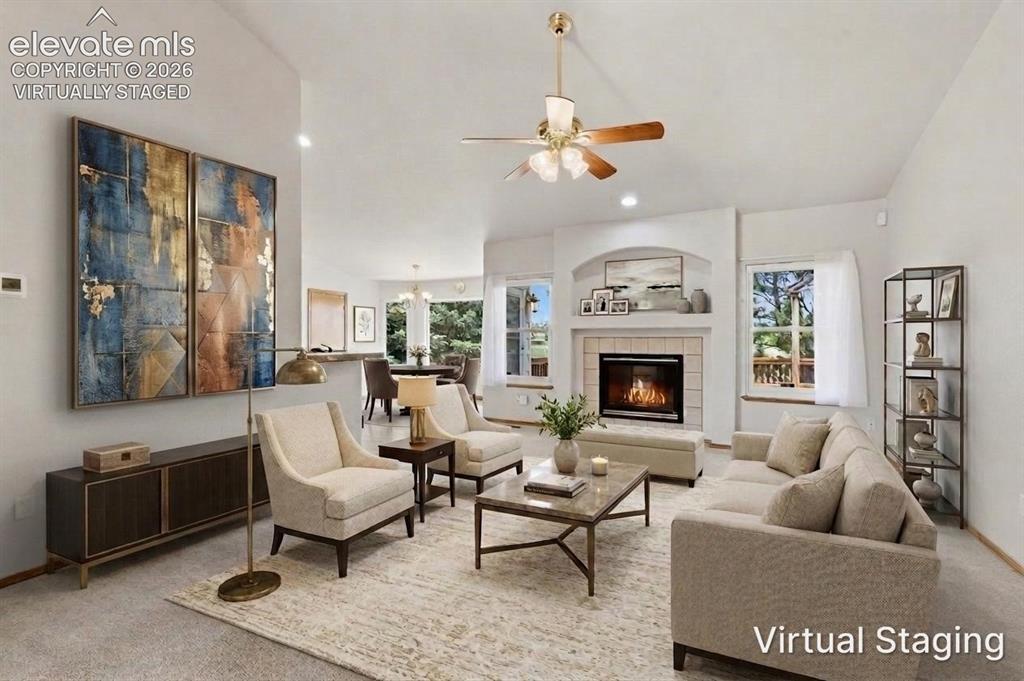 Image 9 of 50: Living room view from foyer virtually staged