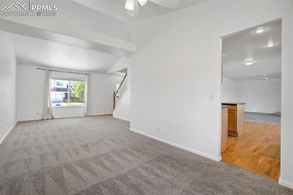 Image 12 of 48: Formal dining leads into Kitchen