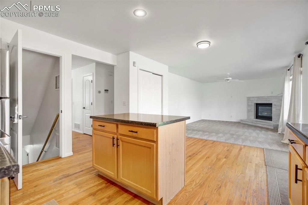 Image 16 of 48: Kitchen overlooking the family room