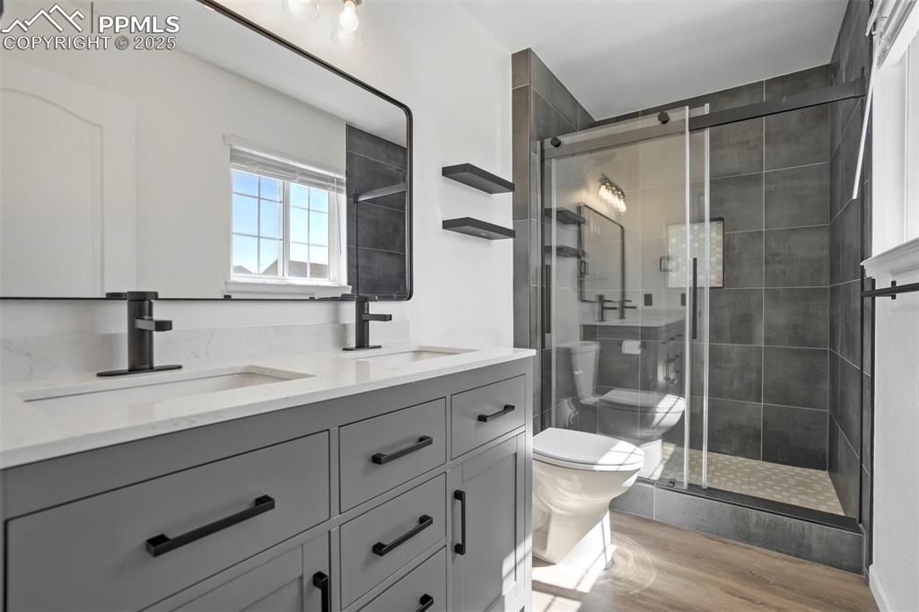 Image 24 of 48: Remodeled primary bathroom
