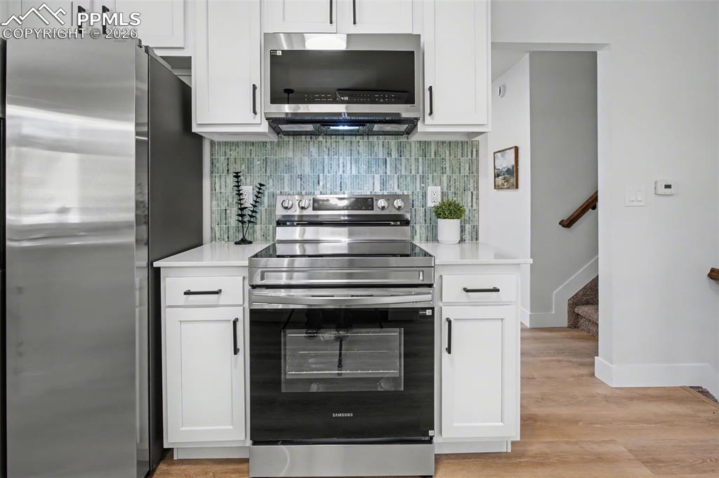 Image 11 of 47: Updated Kitchen with Clean Lines and Functional Layout