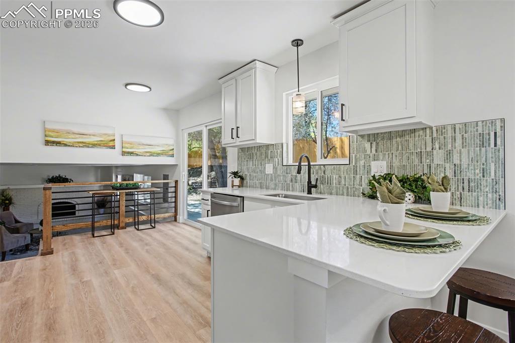 Image 14 of 47: Thoughtful Kitchen Flow Connecting Effortlessly to Living Spaces