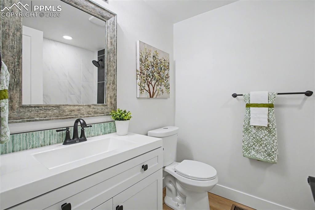 Image 25 of 47: Updated Bathroom with Clean, Modern Finishes