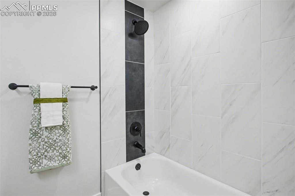Image 26 of 47: Fresh, Functional Bathroom Designed for Daily Ease