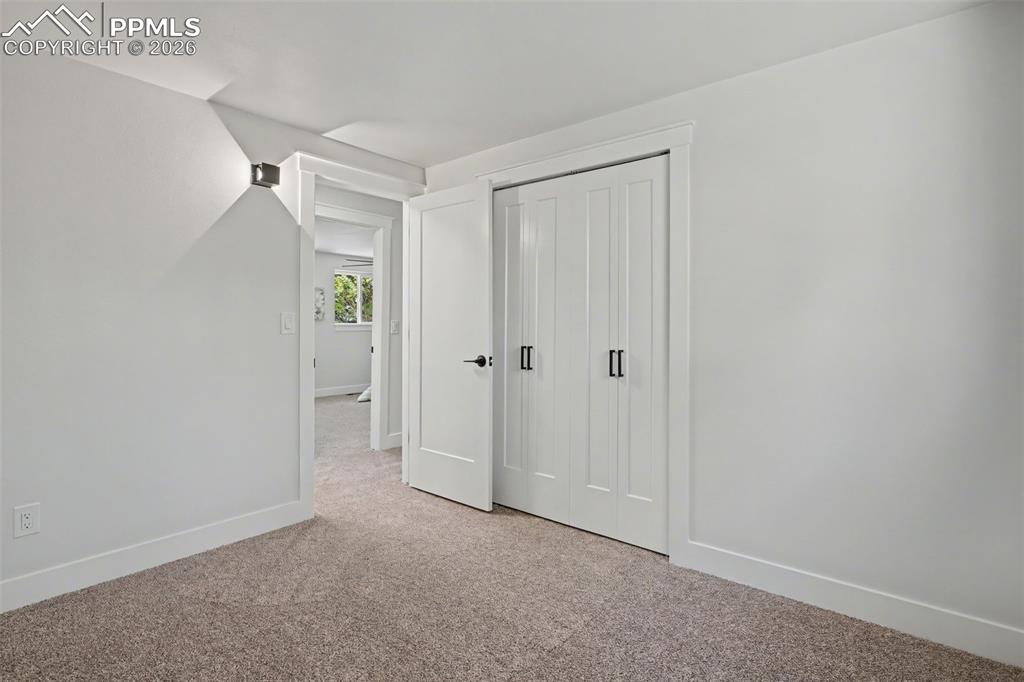 Image 31 of 47: Quiet Lower-Level Bedroom Ideal for Guests or Extended Stay