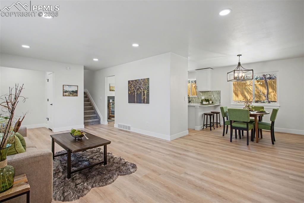 Image 7 of 47: Open-Concept Living with Seamless Flow into Dining