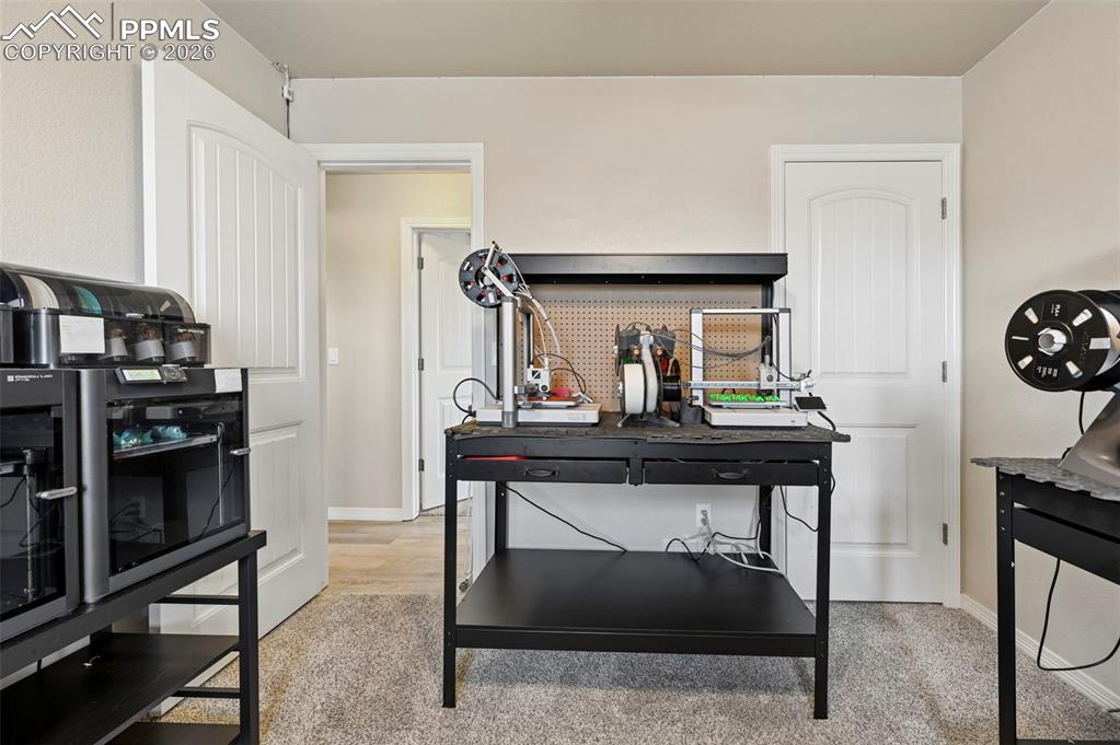 Image 35 of 49: Main level second bedroom