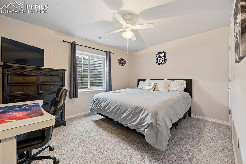 Image 40 of 49: Basement bedroom