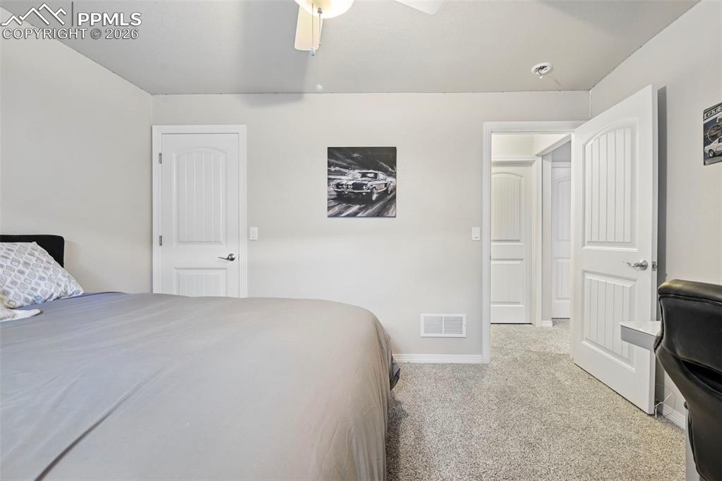 Image 41 of 49: Basement bedroom