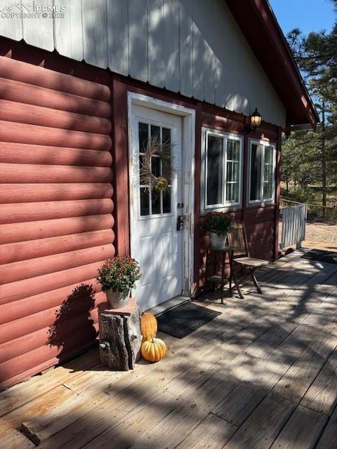 Image 3 of 15: Property entrance with a deck