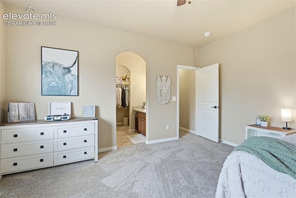 Image 27 of 47: Attached jack and jill bathroom and walk-in closet