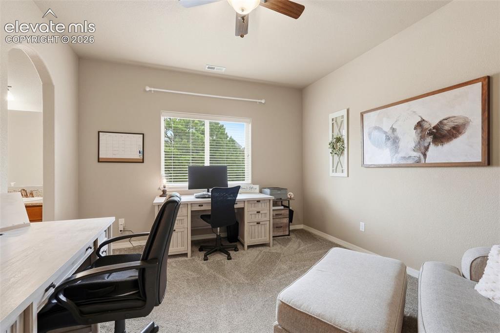 Image 28 of 47: Second large upstairs bedroom currently being used as an office