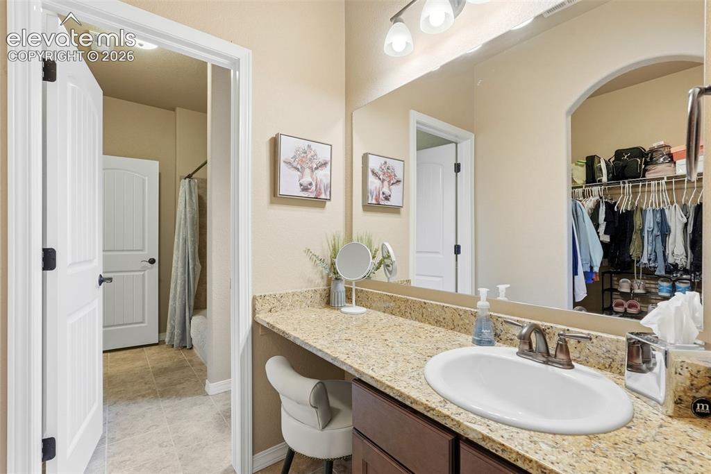 Image 30 of 47: Attached bathroom and walk-in closet