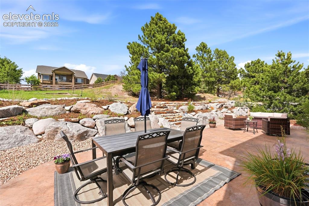 Image 31 of 37: Mature landscaping on a drip system for easy maintenance