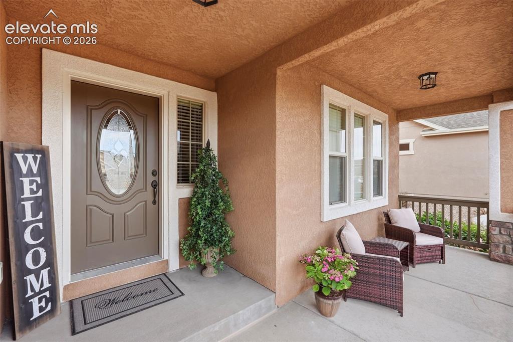 Image 4 of 47: Inviting covered front porch