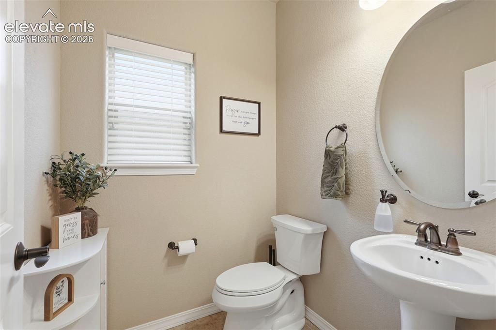 Image 9 of 47: Main level powder room