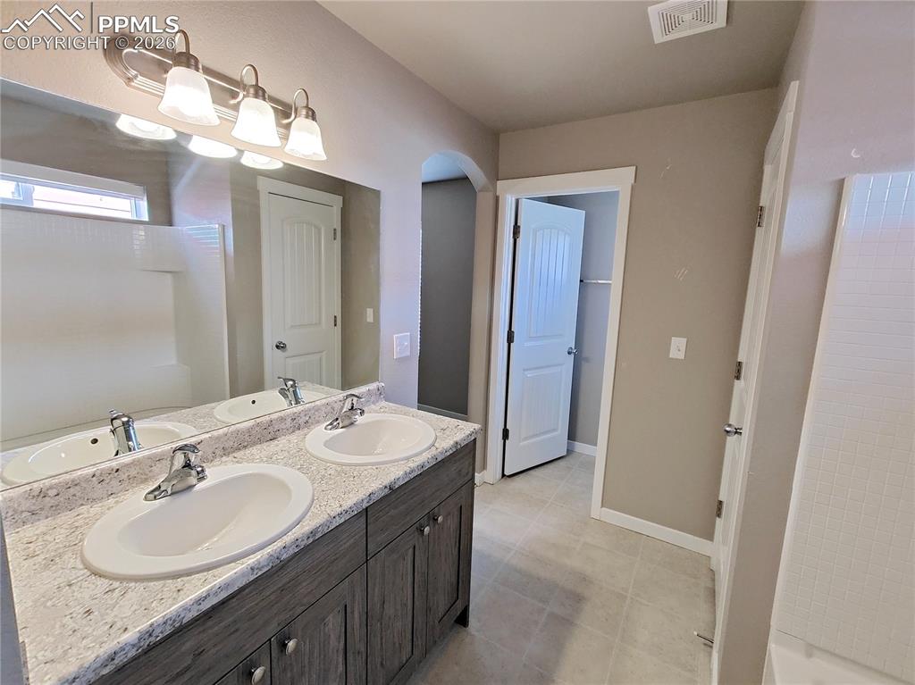 Image 13 of 25: Master Bathroom