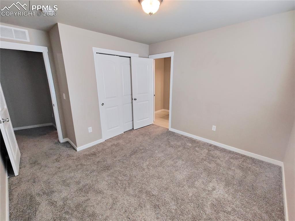 Image 16 of 25: Bedroom