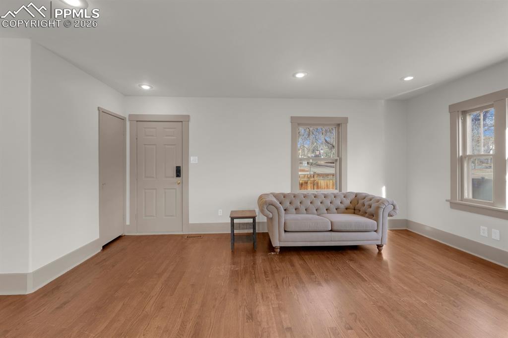 Image 15 of 39: Front door with coat closet