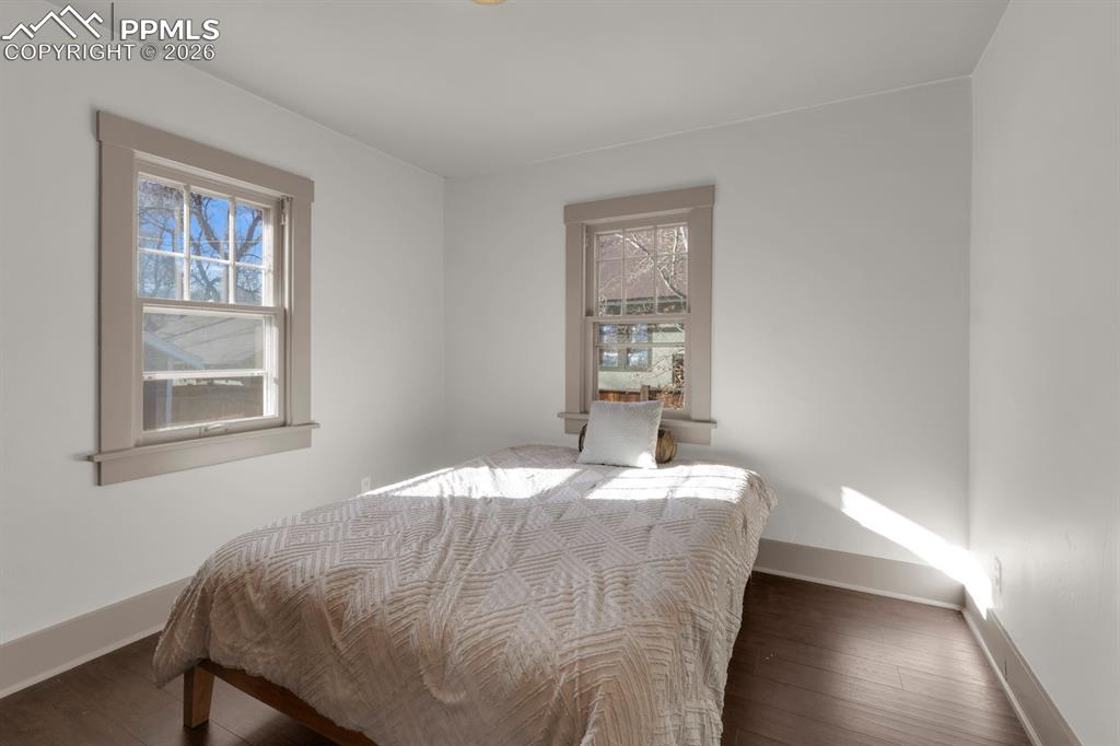 Image 18 of 39: Main level bedroom 2 attached to bathroom