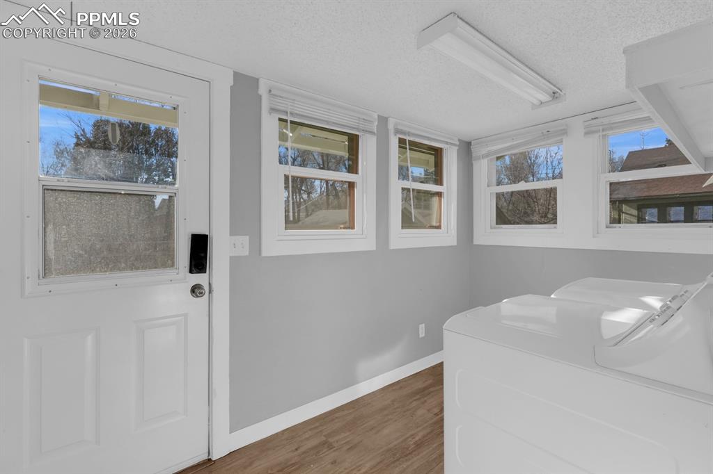 Image 19 of 39: Main level laundry