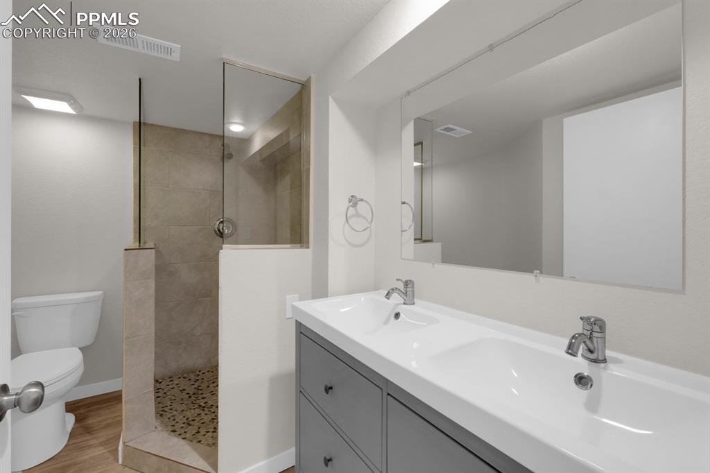 Image 24 of 39: Basement 3/4 bathroom