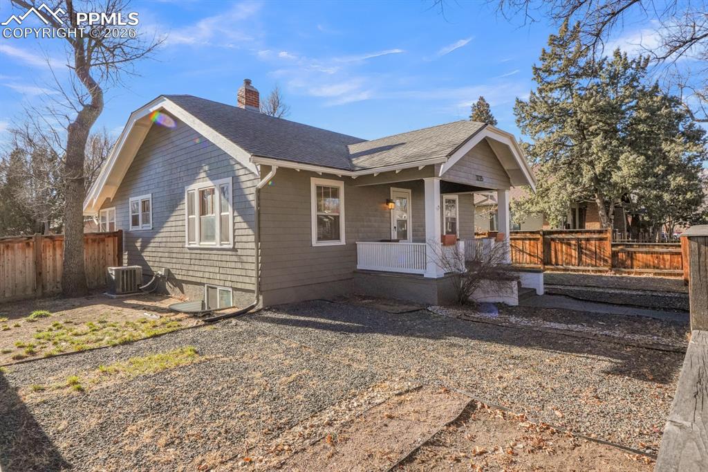 Image 39 of 39: Great yard space & Cozy front porch