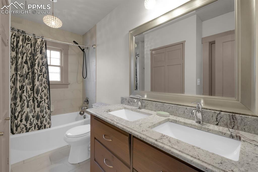 Image 4 of 39: Main level full bathroom